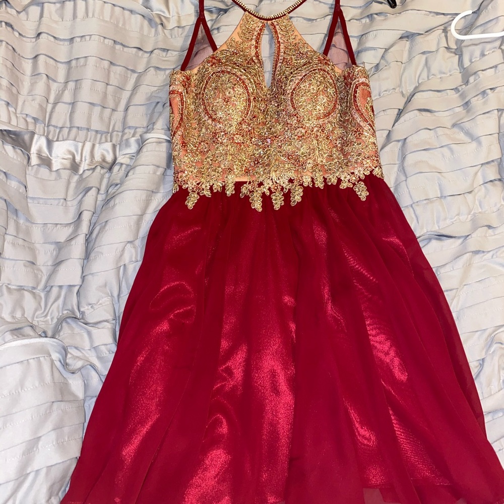 a size small maroon dress from the store “Paris”!